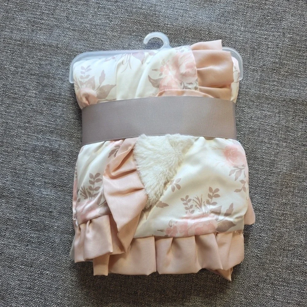 The Peanut Shell Cream Pink Rose Print Satin Back Ruffle Trim Baby Blanket